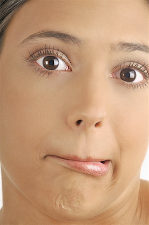 simsearch:644-02152735,k - Female young adult face;crooked mouth Stock Photo - Premium Royalty-Free, Code: 644-02152701
