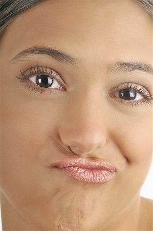 simsearch:644-02152735,k - Female young adult face;funny mouth Stock Photo - Premium Royalty-Free, Code: 644-02152703