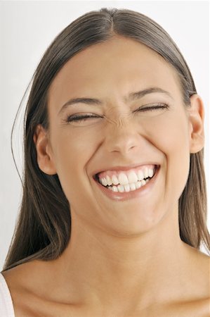 simsearch:644-02152735,k - Female young adult face;laughing Stock Photo - Premium Royalty-Free, Code: 644-02152716