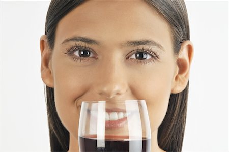 simsearch:644-02153088,k - Female young adult smelling a glass of red wine Stock Photo - Premium Royalty-Free, Code: 644-02152878