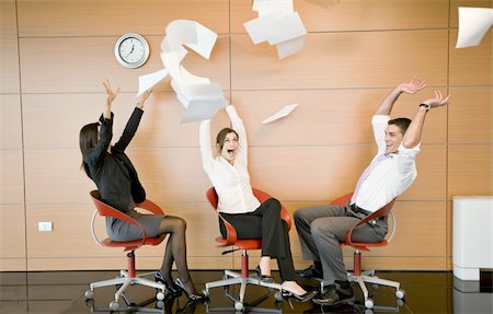 rebellious - Office workers throwing documents up in the air Stock Photo - Premium Royalty-Free, Code: 644-02923108