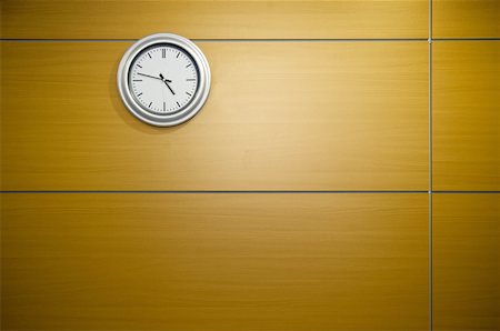 Clock on office wall Stock Photo - Premium Royalty-Free, Code: 644-02923165