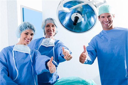 Medical personnel in operating room Stock Photo - Premium Royalty-Free, Code: 644-03672105