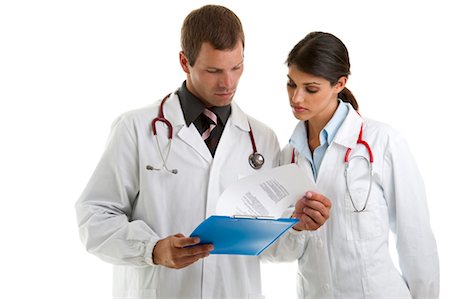 simsearch:644-03659685,k - Two doctors looking at medical chart Stock Photo - Premium Royalty-Free, Code: 644-03672136