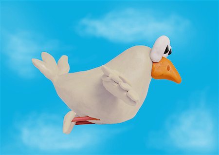 White bird flying in sky Stock Photo - Premium Royalty-Free, Code: 645-01538507