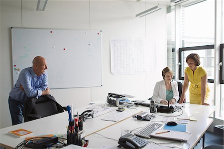 Business people working in office Stock Photo - Premium Royalty-Free, Code: 649-04248153