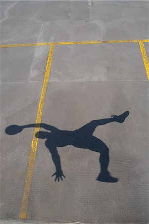 Shadow of basketball player jumping Foto de stock - Sin royalties Premium, Código: 649-04248877