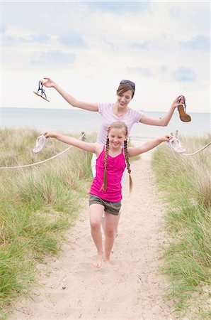 family shoes - Mother and daughter in bare feet Stock Photo - Premium Royalty-Free, Code: 649-04828810