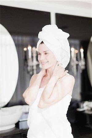 simsearch:649-05521576,k - Woman wrapped in towels in bedroom Stock Photo - Premium Royalty-Free, Code: 649-05521610