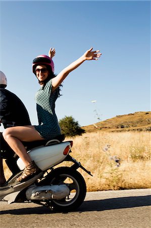 fun drive friends - Women driving scooter on rural road Stock Photo - Premium Royalty-Free, Code: 649-05656890