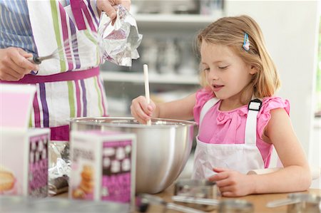 Mother and daughter baking in kitchen Stock Photo - Premium Royalty-Free, Code: 649-05657186