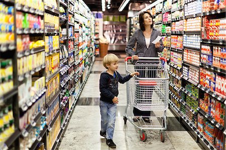 Woman grocery shopping with son Stock Photo - Premium Royalty-Free, Code: 649-05657460