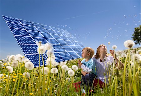 Children in field with solar panels Stock Photo - Premium Royalty-Free, Code: 649-05657720