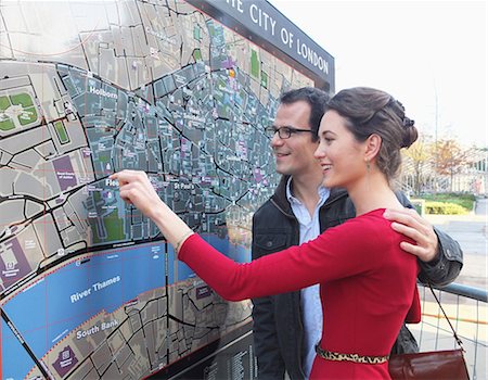 Couple reading London city map Stock Photo - Premium Royalty-Free, Code: 649-05658256