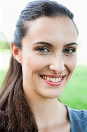 simsearch:649-05819818,k - Close up of womans smiling face Stock Photo - Premium Royalty-Free, Code: 649-05800957