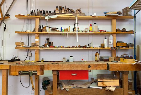 Shelves and desk in carpenters shop Stock Photo - Premium Royalty-Free, Code: 649-05801762