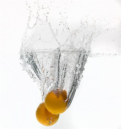 qualitat - Lemons splashing in water Stock Photo - Premium Royalty-Free, Code: 649-05802350