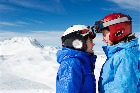 Children standing together in snow Stock Photo - Premium Royalty-Free, Code: 649-05819585