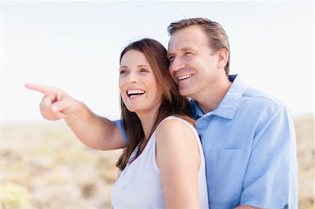 simsearch:649-06717020,k - Smiling couple admiring view outdoors Stock Photo - Premium Royalty-Free, Code: 649-05949938