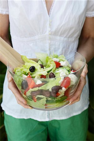 salad bowl - Woman holding bowl of salad Stock Photo - Premium Royalty-Free, Code: 649-06000536