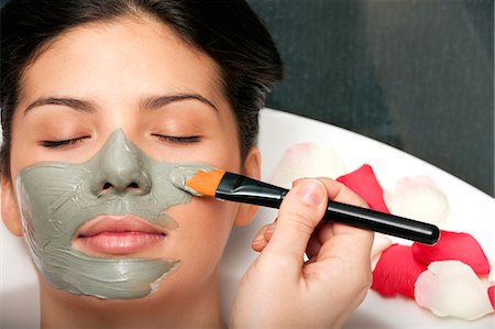 Woman having skin mask applied in bath Stock Photo - Premium Royalty-Free, Code: 649-06000625