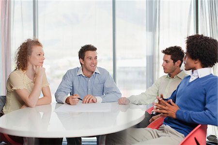 Business people talking in meeting Stock Photo - Premium Royalty-Free, Code: 649-06000796