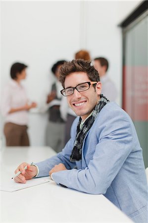 simsearch:649-06000952,k - Businessman making notes in meeting Stock Photo - Premium Royalty-Free, Code: 649-06000866