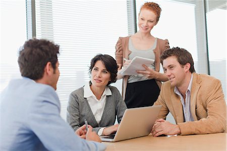 simsearch:649-05648787,k - Business people talking in meeting Stock Photo - Premium Royalty-Free, Code: 649-06000914