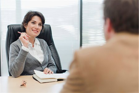 Business people talking in office Stock Photo - Premium Royalty-Free, Code: 649-06000911