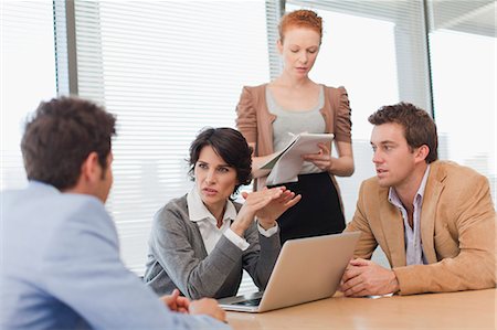 simsearch:649-06000952,k - Business people talking in meeting Stock Photo - Premium Royalty-Free, Code: 649-06000913