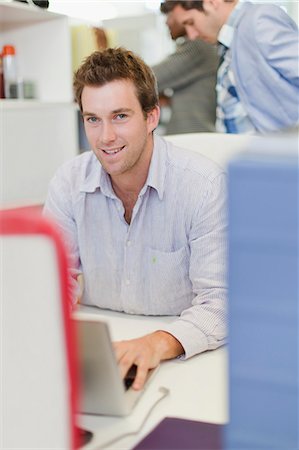 simsearch:649-05648787,k - Businessman working on laptop Stock Photo - Premium Royalty-Free, Code: 649-06000932