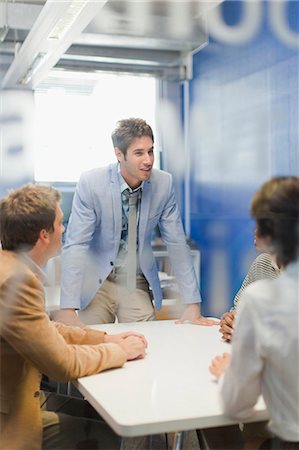 simsearch:649-06040639,k - Business people talking in meeting Stock Photo - Premium Royalty-Free, Code: 649-06000945