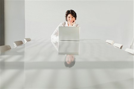 simsearch:649-05648787,k - Businesswoman working on laptop Stock Photo - Premium Royalty-Free, Code: 649-06000964