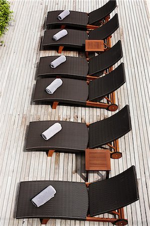 simsearch:649-02054287,k - Aerial view of lawn chairs on deck Stock Photo - Premium Royalty-Free, Code: 649-06001730