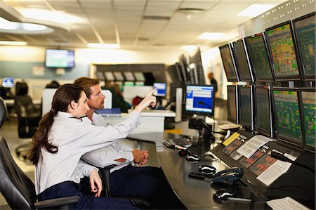 simsearch:649-07239830,k - People working in security control room Stock Photo - Premium Royalty-Free, Code: 649-06040504