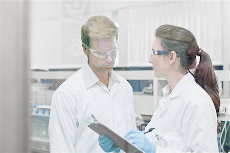 Scientists working together in lab Stock Photo - Premium Royalty-Free, Code: 649-06040525