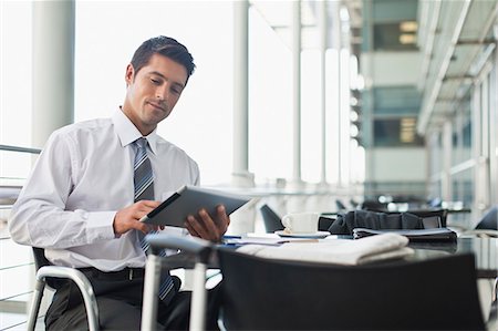people working, tablet, - Businessman with tablet computer in cafe Stock Photo - Premium Royalty-Free, Code: 649-06040587