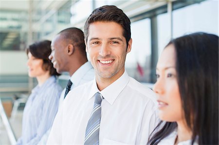 simsearch:649-06040639,k - Close up of businessmans smiling face Stock Photo - Premium Royalty-Free, Code: 649-06040620