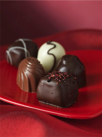 Close up of chocolates on plate Stock Photo - Premium Royalty-Free, Code: 649-06040868