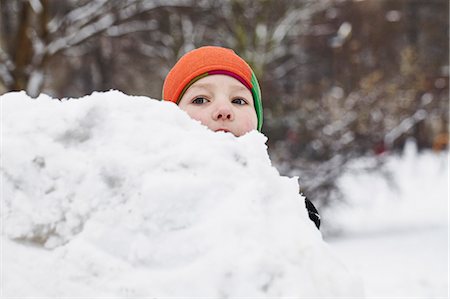 simsearch:649-06041783,k - Boy playing in snow in park Stock Photo - Premium Royalty-Free, Code: 649-06041007