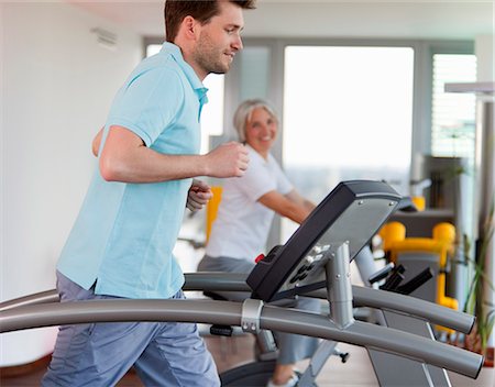 simsearch:649-06041068,k - Man using treadmill in gym Stock Photo - Premium Royalty-Free, Code: 649-06041094
