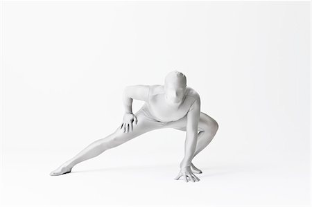 flexible (people or objects with physical bendability) - Man in bodysuit posing Foto de stock - Sin royalties Premium, Código: 649-06041700