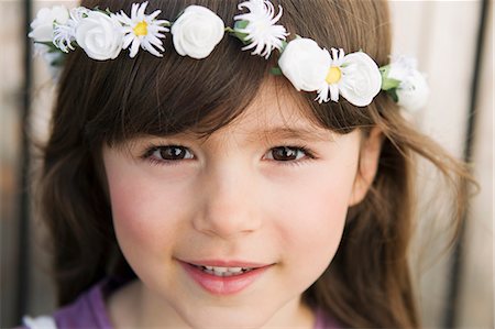 Close up of girl wearing flower crown Stock Photo - Premium Royalty-Free, Code: 649-06112562