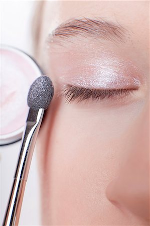 eyelid - Close up of girl applying makeup Stock Photo - Premium Royalty-Free, Code: 649-06113072