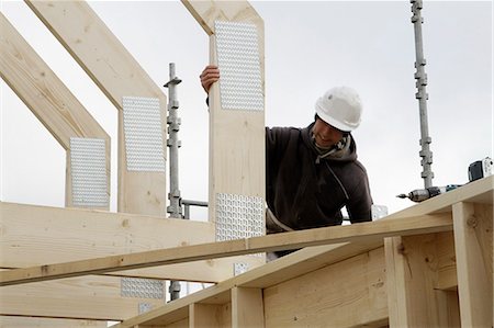 simsearch:693-06016727,k - Builder at work on new structure Stock Photo - Premium Royalty-Free, Code: 649-06113855