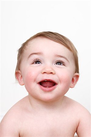 Gros plan des garçons de bébé souriant visage Photographie de stock - Premium Libres de Droits, Code: 649-06164432