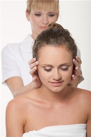 simsearch:649-06164622,k - Smiling woman having scalp massage Stock Photo - Premium Royalty-Free, Code: 649-06164623