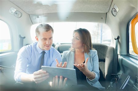 person with tablet - Business people using tablet computer Stock Photo - Premium Royalty-Free, Code: 649-06164724