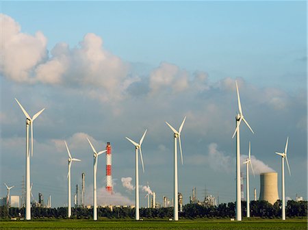 Wind turbines with nuclear smokestack Stock Photo - Premium Royalty-Free, Code: 649-06164877