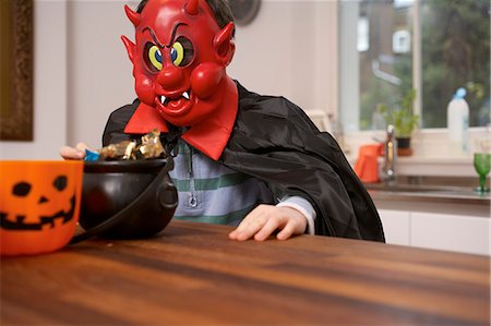 devil - Boy wearing Halloween costume Stock Photo - Premium Royalty-Free, Code: 649-06165210